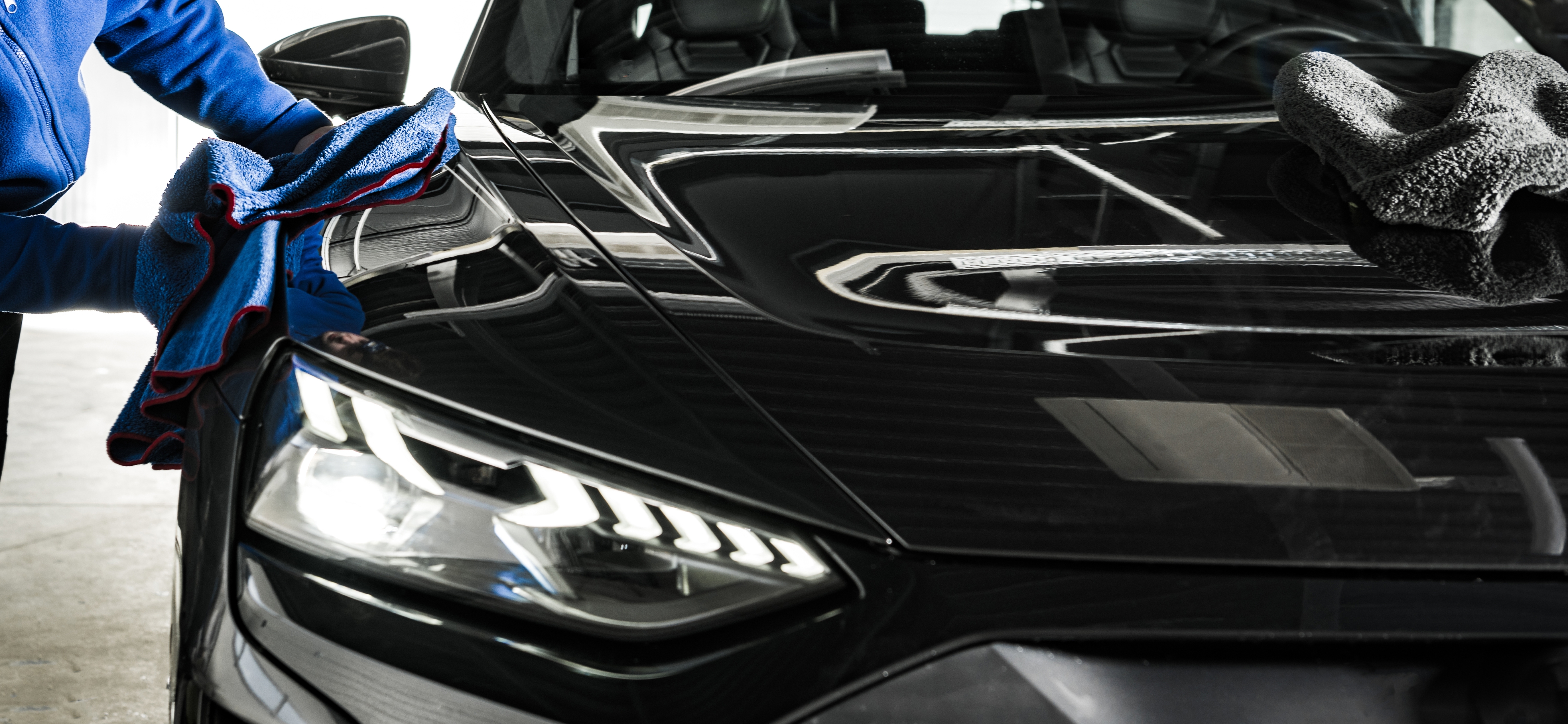 Front,View,Of,Luxury,Sport,Car,Being,Wiped
